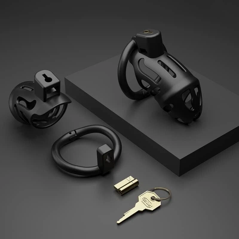 Black locking devices with a gold key arranged on a dark display